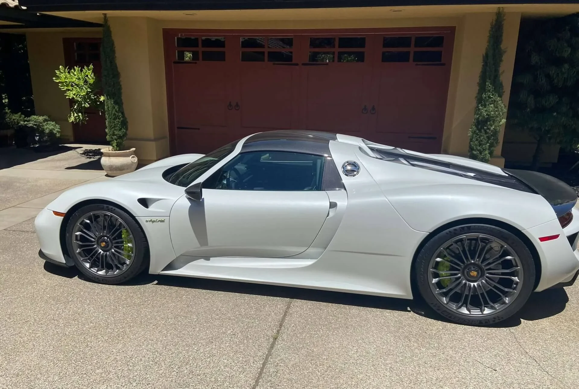 SEALED client's white sports car